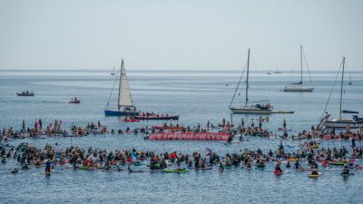 SAS paddle out protest Falmouth G7