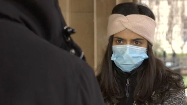 Ria Chatterjee with asylum seeker (c) ITV News