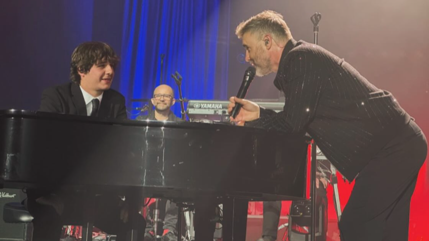 Brad Kella performed 'A Million Love Songs' on stage alongside Gary Barlow in the Isle of Man.