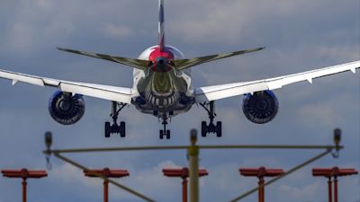 A plane lands at Heathrow Airport