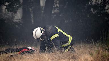 Firefighters continue to tackle massive blaze in France as temperatures soar