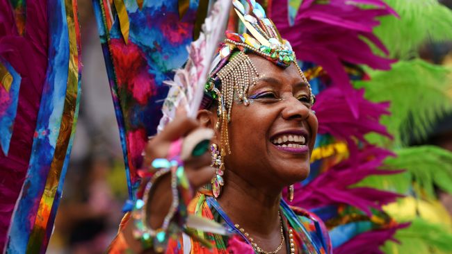 A dancer performs during the Notting Hill Carnival in London, which returned to the streets for the…