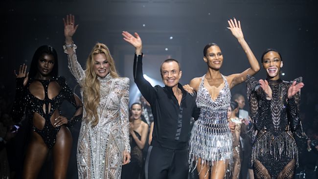 Julien Macdonald on the catwalk during his at London Fashion Week 2023 in February.