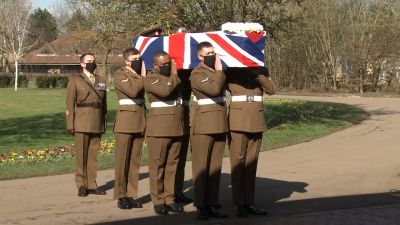 The coffin of Captain Sir Tom Moore was carried by members of the Armed Forces during his funeral at Bedford Crematorium. 