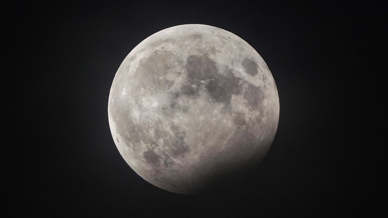 How to spot tonight's blue moon with a partial lunar eclipse