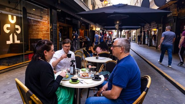People return to dining in Melbourne, Australia as lockdown ends.
Associated Press