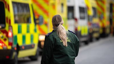 A paramedic with ambulances outside the Royal London hospital in London after Prime Minister Boris Johnson ordered a new national lockdown for England which means people will only be able to leave their homes for limited reasons, with measures expected to stay in place until mid-February.