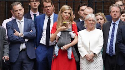 Scottish Secretary Alister Jack (far right) joins the Prime Minister's wife Carrie Johnson and other close colleagues to watch him deliver his resignation statement from Downing Street on Thursday.