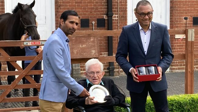 Johnny Tolton receives his trophy at the National Horseracing Museum in Newmarket.