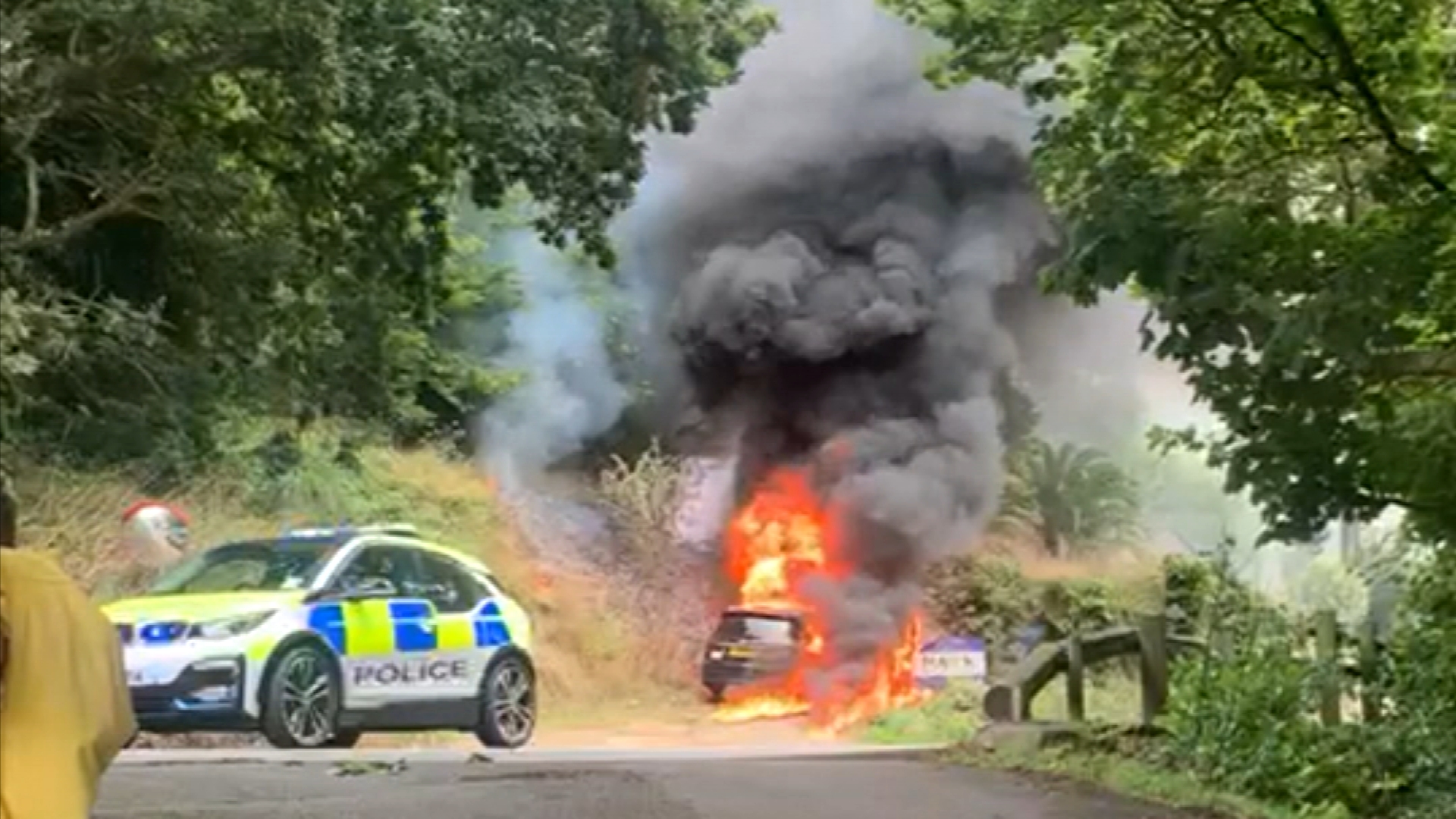 Taxi catches fire and left totally burned out while driving down