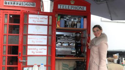 Lily Deluca, from Sao Paolo, who has found her calling during the Covid-19 pandemic after turning a red phone box into a mini coffee kiosk on Tunsgate in Guildford