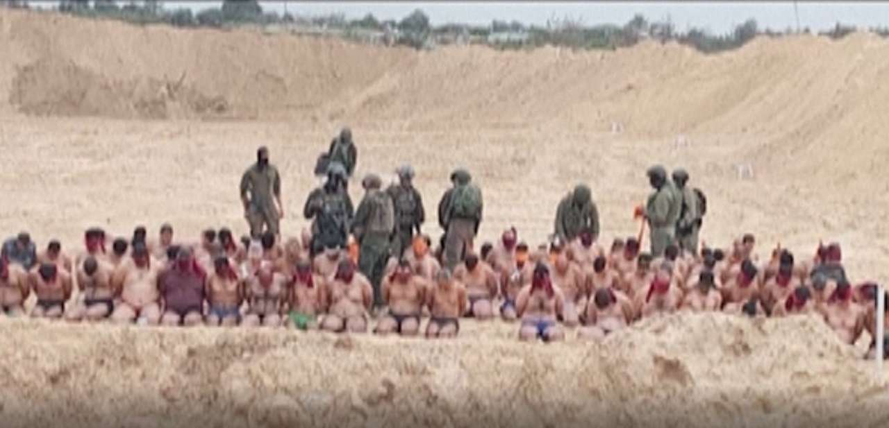 Palestinian men stripped and lined up in streets of Gaza, footage shows