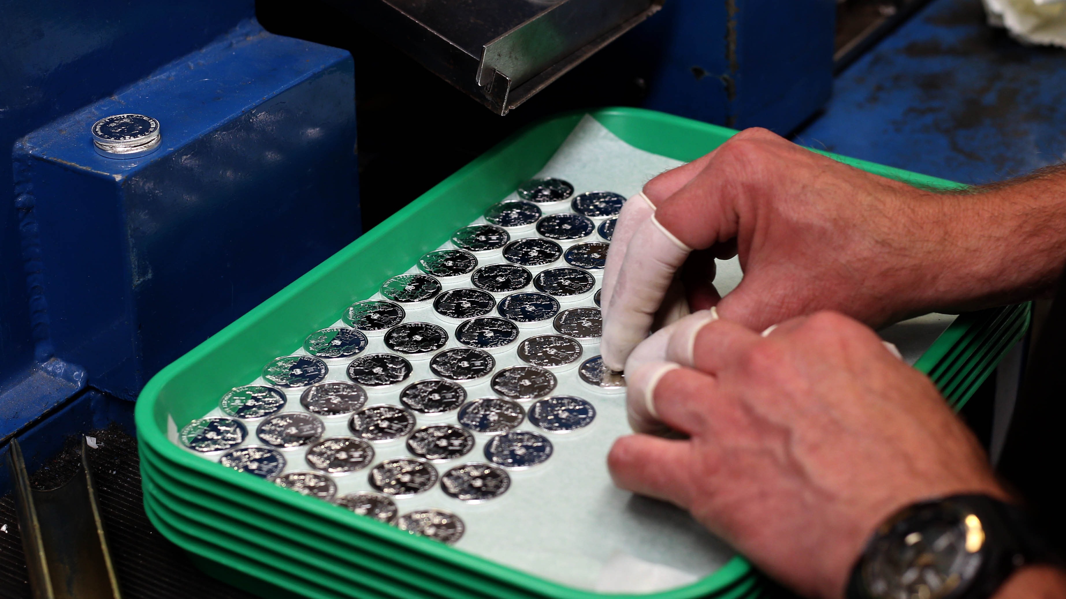 Coins being produced at the Royal Mint in Wales.