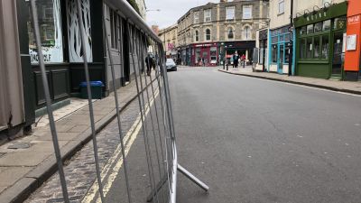 Barriers in the road outside businesses will give customers more space