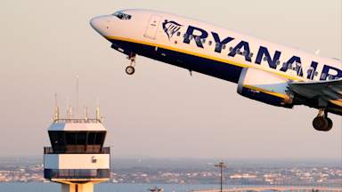 Ryanair investigated over charging parents to sit with children