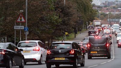 Cars on road in London