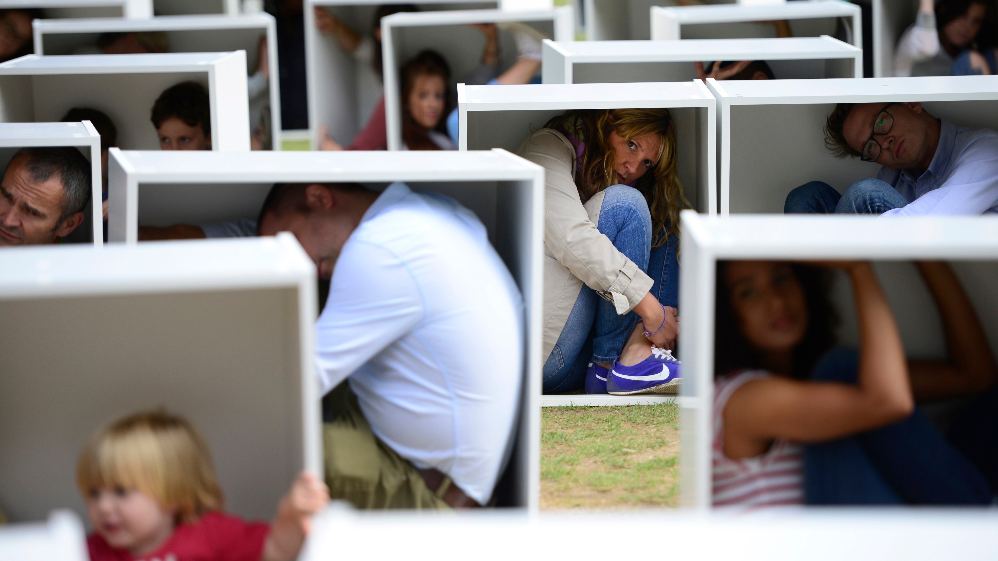 150 protesters squash themselves into small, white boxes | ITV News London