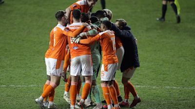 Blackpool players celebrate with goalkeeper Chris Maxwell after beating West Brom on penalties in the FA Cup