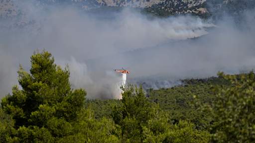 Two helicopters collide while tackling wildfires in Greece