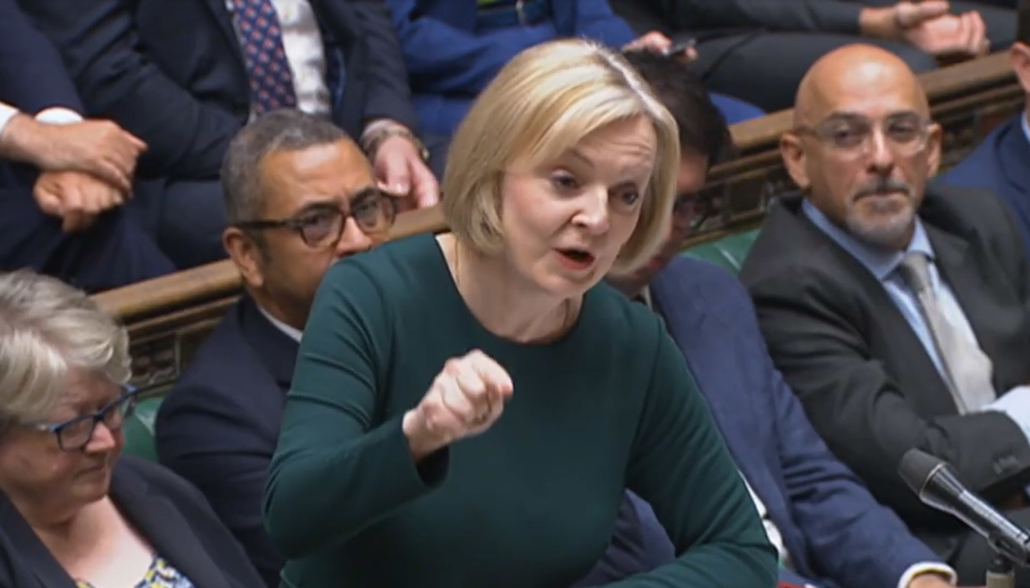 Liz Truss insists she is not planning spending cuts as economic turmoil ...