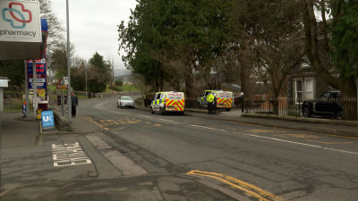 Police are standing guard where the man's body was found.