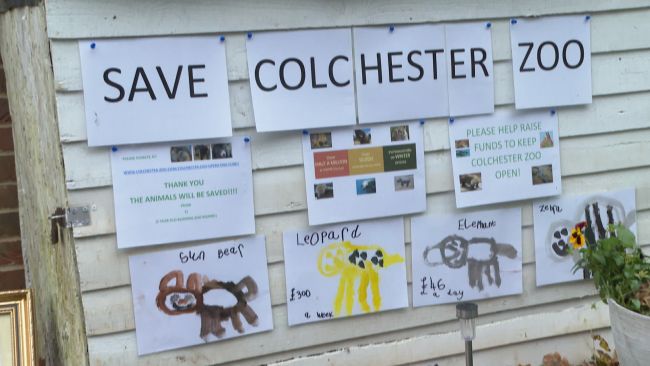 Please donate here, Sign at Colchester Zoo, Essex., Howard Lake