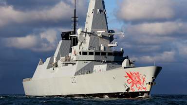 What is HMS Dragon and what are its capabilities?