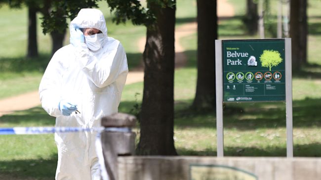 A Police forensic officer at the scene where a body was found after a fire in the early hours of this morning in Belvue Park, west London.