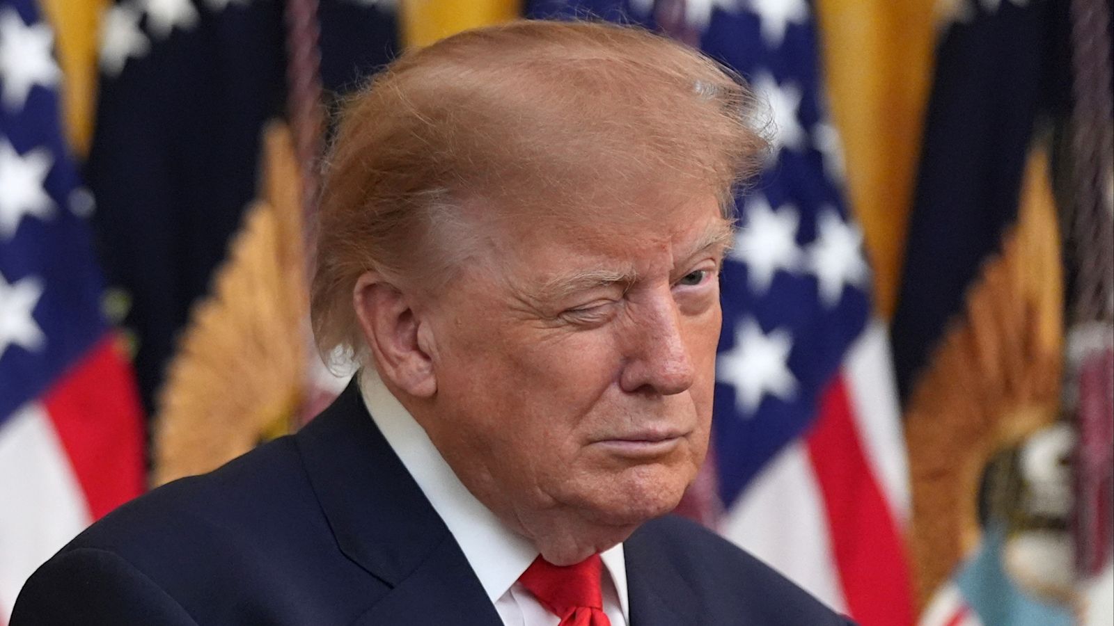 Photo: itv.com President Donald Trump winks during a Columbus Day celebration in the East Room of the White House, Friday, Oct. 9, 2026, in