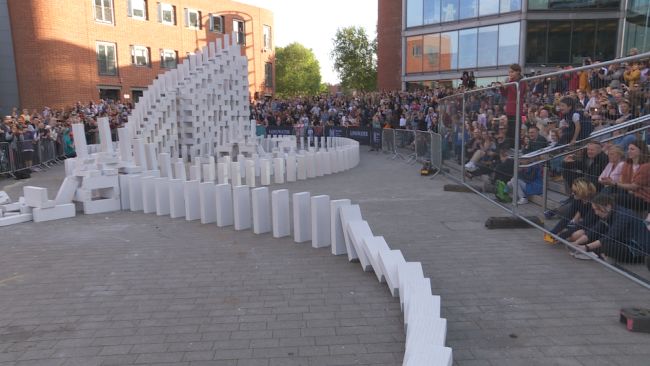 A giant domino topple was held in Norwich.