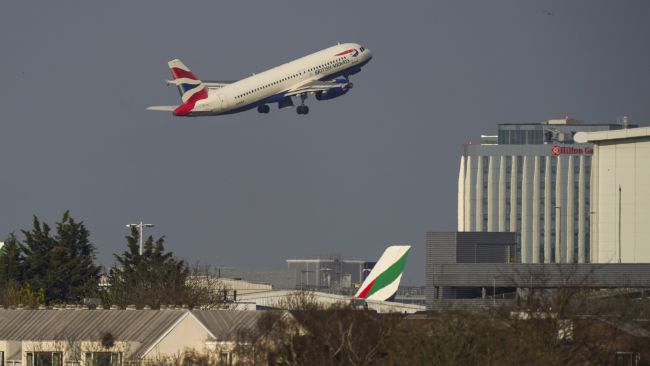 A British Airways plane takes off from Heathrow airport in West London