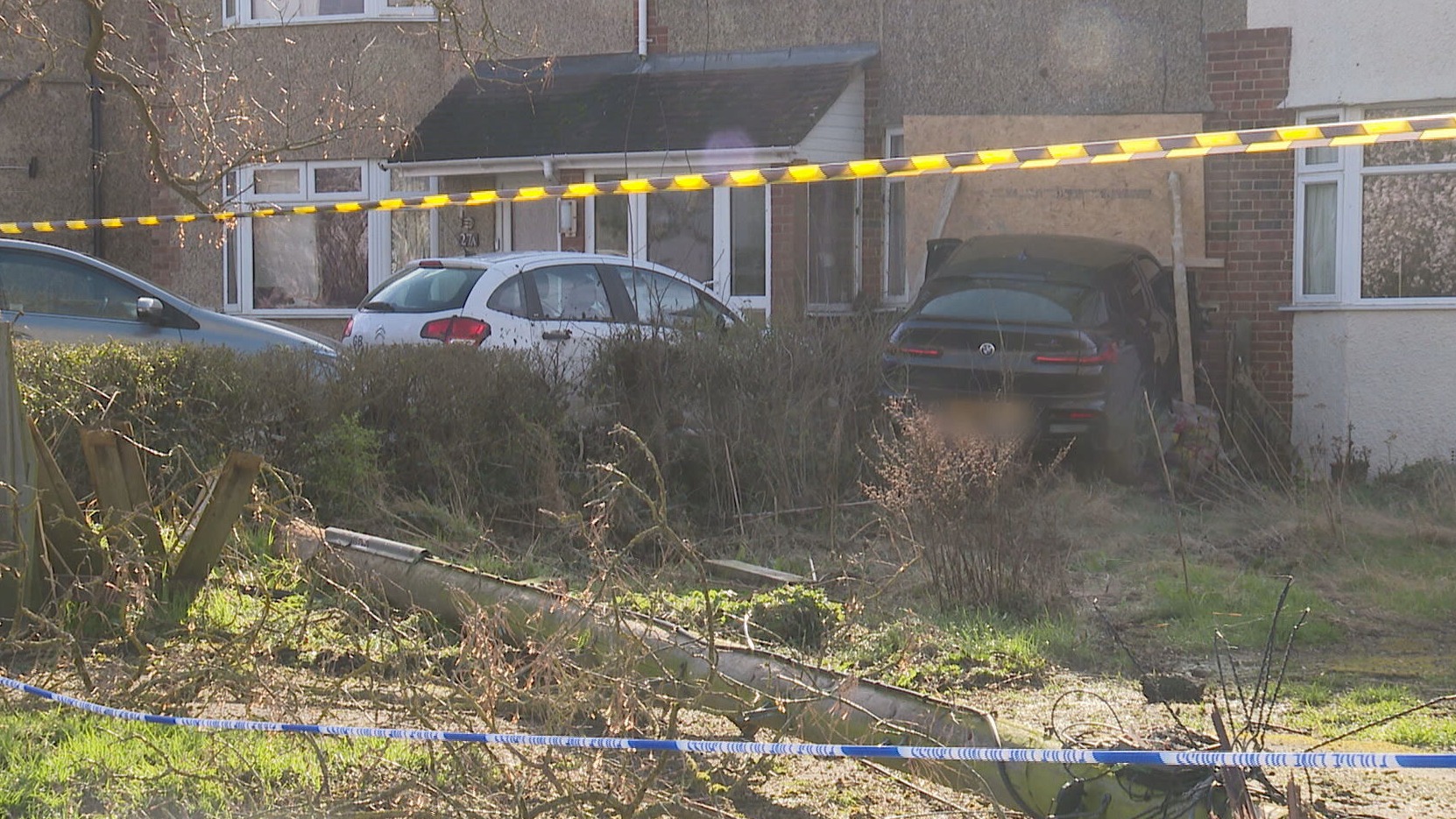 Car knocks down telegraph pole and crashes into front room of ...