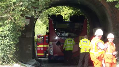 It happened on Well House Lane. The collision caused significant damage to the top of the bus.