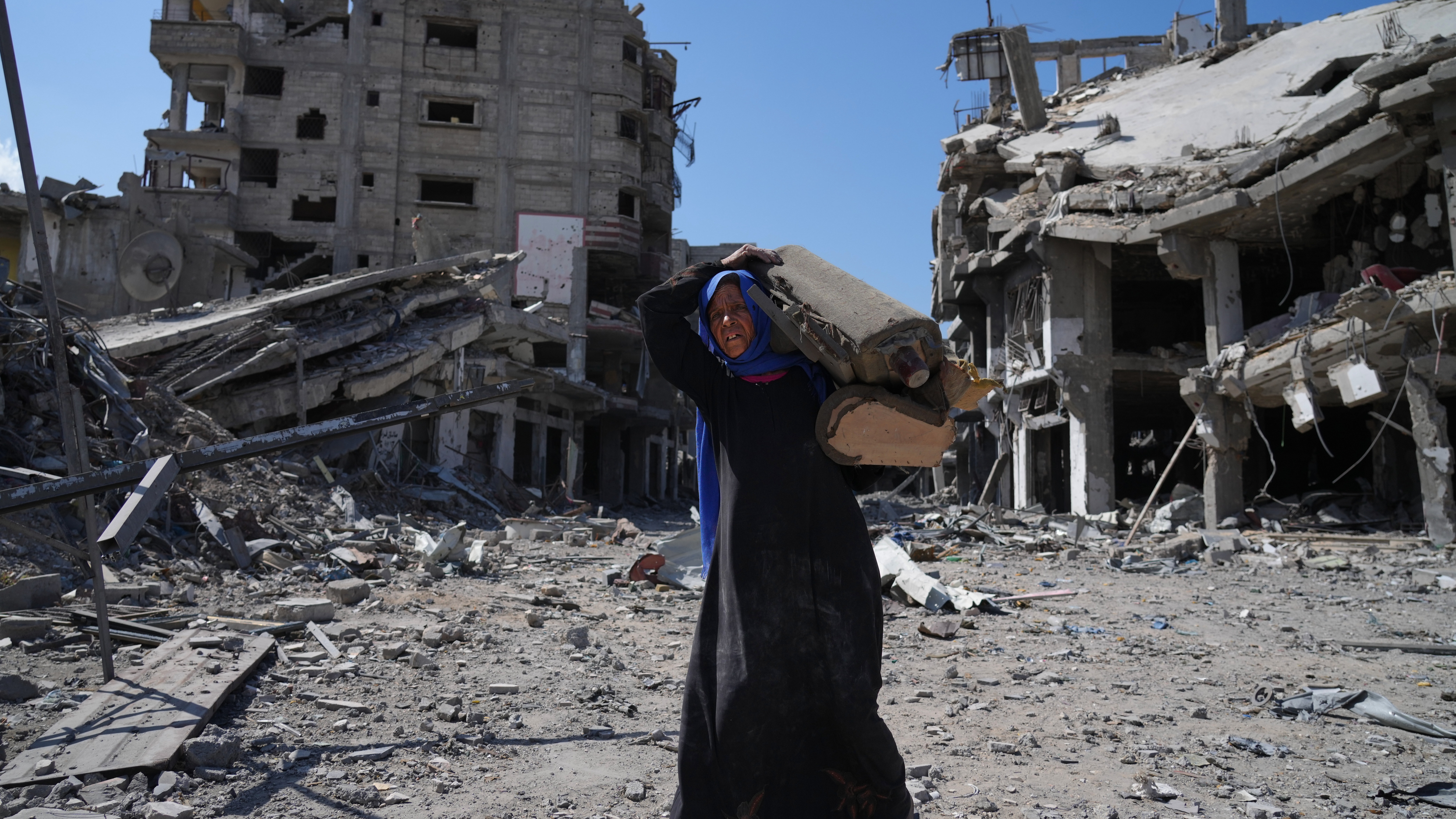 Thousands return to Gaza after ceasefire deal comes into effect