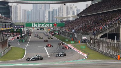 FILE - In this Sunday, April 14, 2019, file photo, drivers prepare for the start of the Chinese Formula One Grand Prix at the Shanghai International Circuit in Shanghai, China. Formula One's governing body on Wednesday, Feb. 12, 2020, says Shanghai Grand Prix scheduled for April postponed due to virus. (AP Photo/Ng Han Guan, File)