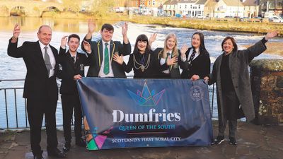 25/11/21. The bid to make Dumfries a city is launched. Pictured are – left to right – Mark Jardine, of the People’s Project; Tom Harper, head boy from Dumfries Academy; Craig Adams, school captain at Dumfries High School; Provost Tracey Little; Abi Kelly, school captain at Dumfries High School; Sophie Ritchie, school captain at St Joseph’s College and Kirsten Scott, engagement lead for Dumfries foundation restoration project. Picture from Queen of the South campaign.