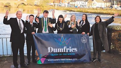 25/11/21. The bid to make Dumfries a city is launched. Pictured are – left to right – Mark Jardine, of the People’s Project; Tom Harper, head boy from Dumfries Academy; Craig Adams, school captain at Dumfries High School; Provost Tracey Little; Abi Kelly, school captain at Dumfries High School; Sophie Ritchie, school captain at St Joseph’s College and Kirsten Scott, engagement lead for Dumfries foundation restoration project. Picture from Queen of the South campaign.