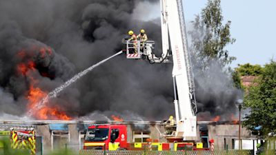 Firefighters tackling a blaze