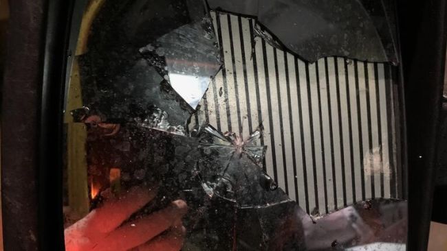 Handout photo dated 06/01/21 issued by South Central Ambulance Service NHS Foundation Trust of the smashed mirror of an ambulance that was vandalised while its paramedics were treating a patient in Slough, Berkshire.
