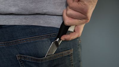 A focus on stop and search at the expense of neighbourhood policing has been blamed for the rise of knife crime in London, a new report claims.
The centre-right Policy Exchange report said the Metropolitan Police (MPS) followed an “unusual and unjustified strategy” of using stop and search in the face of a spike in knife crime rather than target high-profile drug traffickers and putting boots on the ground.
It said the number of fatal stabbings in London doubled between 2013 and 2019 despite better survival rates for victims of knife attacks.
Titled Knife Crime in the Capital, the report also found London’s “knife crime crisis” impacted certain groups more than others – with black people nearly five times more likely to be admitted to hospital as a result of being stabbed than white or Asian people, and people under 25 accounting for more than half of hospital admissions for stabbings in London in 2019/20.
It said: “The strategy the MPS has chosen to pursue is highly irregular when compared to other big cities, even when taking the unique challenges of policing London into account.”
The report said, compared with forces in Merseyside, the West Midlands and West Yorkshire, the Met had the highest rate of stop and search, and the lowest for apprehending drug traffickers and second lowest rate of officers involved in neighbourhood policing.
It added: “Suppression through measures such as stop and search is essential, but the MPS has over the last few years relied too heavily on this tactic alone, without building support for its activities from the communities most in need of help.
“Although the policing of London presents unique challenges in terms of the complexity and scale of the task, the MPS seems to have an unusual and unjustified strategy, combining a relatively high rate of stop and search with weak community policing and targeting of high-profile criminals.”
The report also said the recent fall in knife crime was “attributable almost entirely to lockdown measures” and the Met needed to “prepare for an upswing in violent crime, before knife crime spirals out of control again”.
As part of the recommendations, the report suggested the police and bodies relating to policing do more to explain data around crime and police operations.
“The fact that ‘Black people are nine times more likely to be stopped and searched’ is frequently reported in the media, despite the fact that this is a highly misleading narrative that undermines the relationship between the police and the communities most affected by crime,” it said.
“It is important to remember that the real injustice is that young black men have a higher victimisation rate and are more likely to die on the streets of London, not that they are subject to higher rates of stop and search.”
The report, published on Monday, contained a foreword from former Met assistant commissioner Sir Mark Rowley, where he said there was an argument for a “fresh look” at policing tactics.
He said: “The Met appears to adopt a highly suppressive approach yet puts fewer resources and less effort into community policing and pro-active prosecution of drugs gangs.
“The Met has deteriorating detection rates for knife crime. This is not an argument against stop and search – it is a vital tactic that the Commissioner was right to increase – but it is an argument for a fresh look at whether a different mix of tactics such as those seen elsewhere may be more successful.”
In a statement, a Metropolitan Police spokesman said: “We very deliberately are targeting and putting more resources into areas blighted by higher levels of violence and other serious crime. We use a range of tactics to tackle violence of which stop and search is just one element.
“Stop and search is just one of the tactics that helps us drive down the number of young people stabbed on our streets, it leads to the arrest of dangerous criminals, prevents crime, protects people and deters potential offenders. Every month through this tactic alone, the Met seizes around 400 weapons.
“We understand that how we carry out stops and search is vital and that inherently the experience is intrusive and can be embarrassing for the person being searched. Therefore we strive to make every encounter of stop and search professional and courteous.
“We are taking steps to better listen and respond to concerns. We are working with our communities to improve our use of stop and search, including involving them in improving our training through their lived experiences of having been stopped and searched.
“We want to be accountable and transparent. The use of stop and search powers is rightly scrutinised both within the Met and externally through the Community Monitoring Groups and the Independent Office for Police Conduct.”