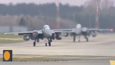 Two F15 fighter jets on a taxiway at RAF Lakenheath