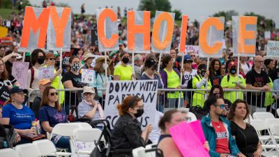 Abortion rights demonstrators rally, Saturday, May 14, 2022, on the National Mall in Washington. Demonstrators are rallying from coast to coast in the face of an anticipated Supreme Court decision that could overturn women’s right to an abortion. 