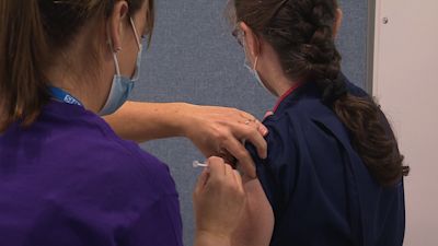 Nurse having covid booster at Addenbrooke's
