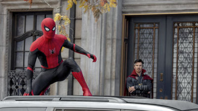 This image released by Sony Pictures shows Tom Holland, left, and Benedict Cumberbatch in Columbia Pictures' "Spider-Man: No Way Home." (Sony Pictures via AP)