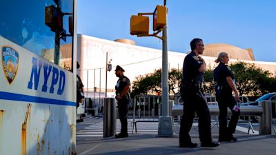 Members of the New York City Police Department walk near the United Nations headquarters, Sunday, Sept. 19, 2021, in New York. The 76th Session of the U.N. General Assembly begins this week. (AP Photo/Craig Ruttle)