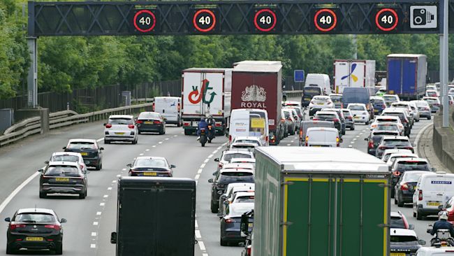Vehicles queue on the M25 motorway near Egham, Surrey, on day two of the Platinum Jubilee…