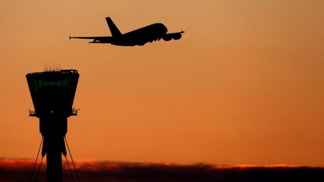 File photo dated 19/01/16 of a plane at sunset over Heathrow Airport in London. Online travel firm loveholidays has revealed that artificial intelligence is helping the group expand further across Europe as it uses the technology to speed up its route into new countries.
