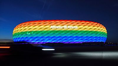 Munich’s stadium is illuminated in rainbow colors on the occasion of Christopher Street Day in Munich, Germany, Saturday, July 9, 2016. UEFA has declined the Munich city council’s application to have its stadium illuminated in rainbow colors for Germany’s final Euro 2020 group game against Hungary on Wednesday June 23, 2021. (Tobias Hase/dpa via AP)