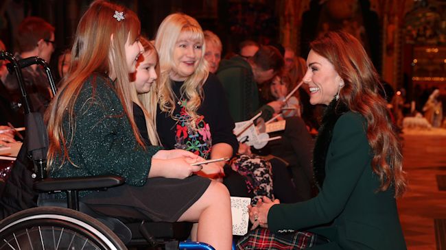 The Princess of Wales speaks with guests