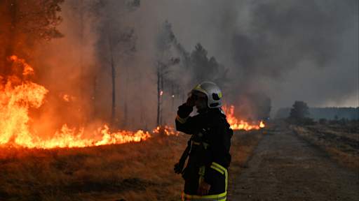 Macron calls crisis talks as wildfires in Spain and France force 300,000 to flee